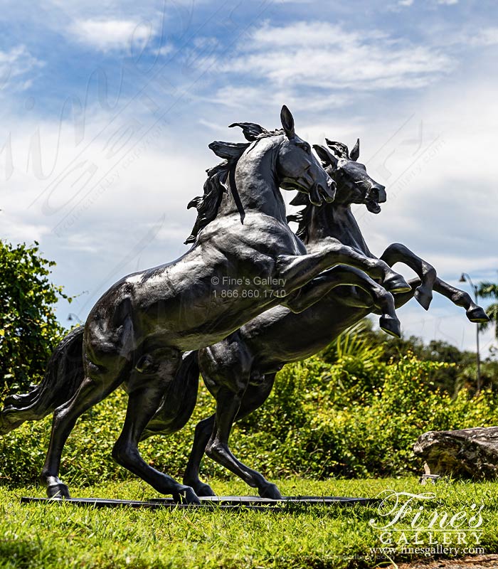 A Pair of Rearing Bronze Horses