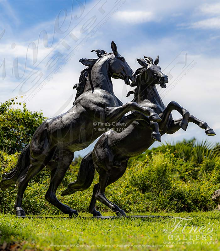 A Pair of Rearing Bronze Horses