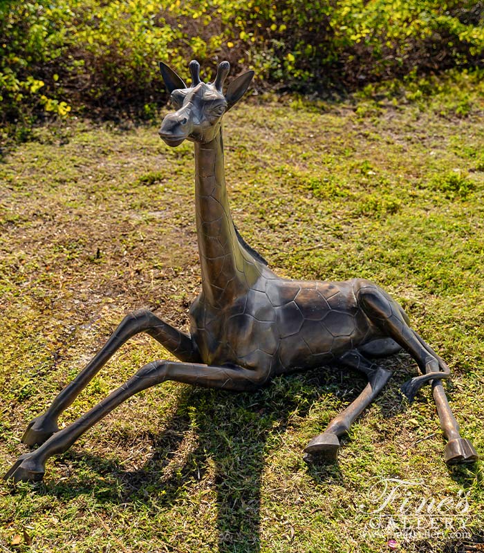 Resting Giraffe Statue in Bronze