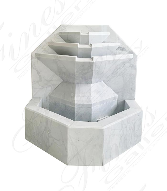 A Modern Wall Fountain In White Marble