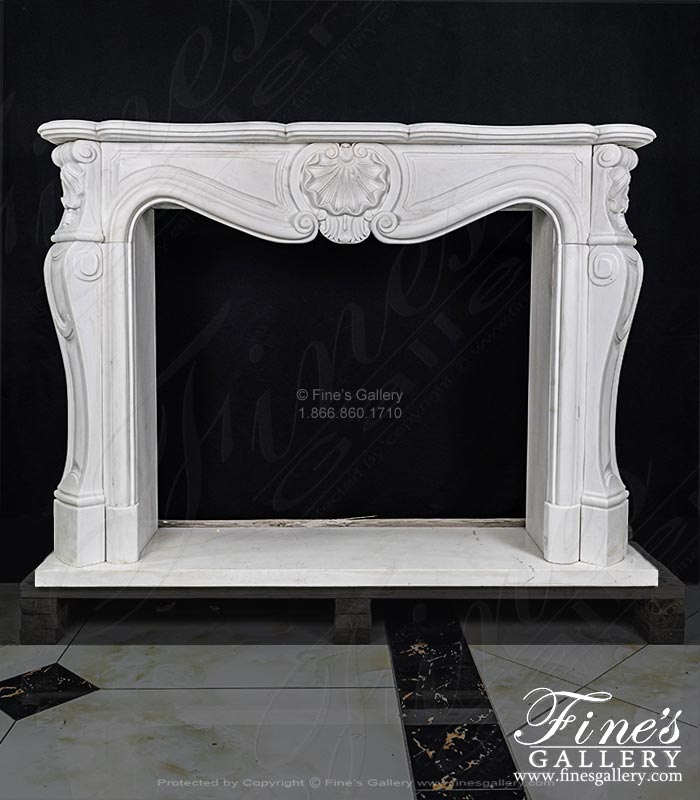 Clean French Marble Fireplace Mantel with Shell Motif